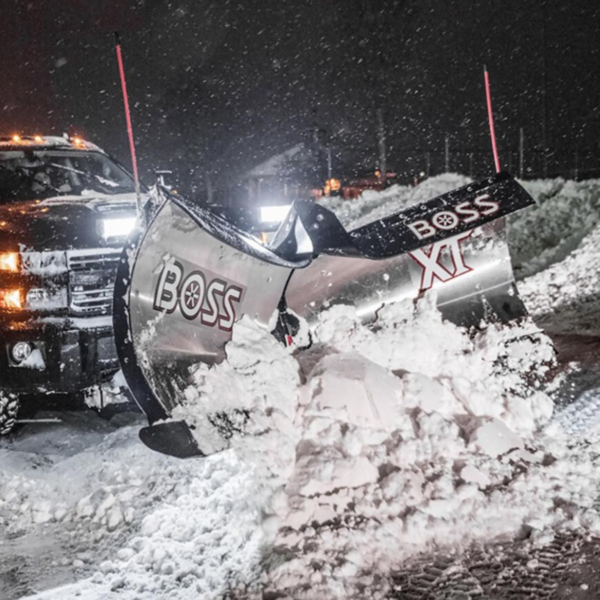 Snow plowing with BOSS plow — Be There Lawncare Haslett MI